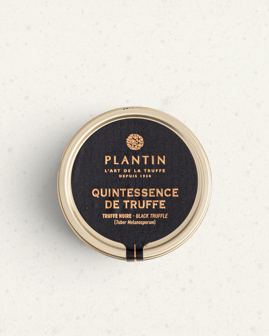 Closed black tin of Plantin black truffle quintessence with gold Quintessence de truffe lettering