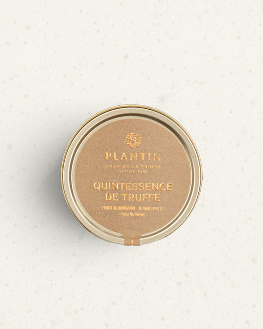 Closed gold tin of Plantin autumn truffle quintessence with Quintessence de truffe printed on the lid