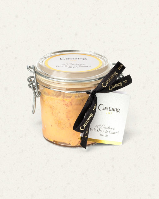 Castaing duck foie gras in a large clip-top glass jar, tied with a black Castaing ribbon and tag
