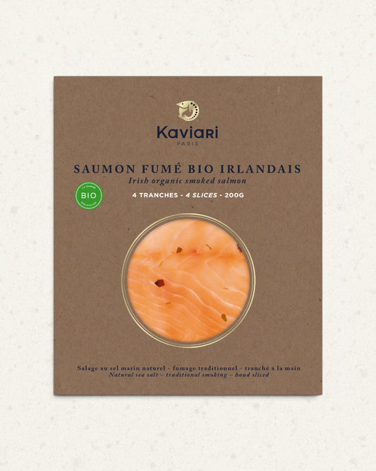 Kraft-brown pack of Kaviari organic Irish smoked salmon, four slices visible through a round window