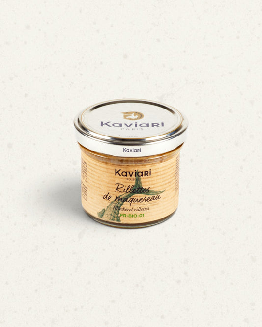 Small glass jar of Kaviari mackerel rillettes with a silver lid and a green fish drawing on the label